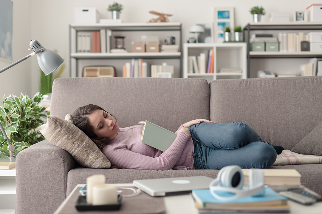 Woman falls asleep on the sofa