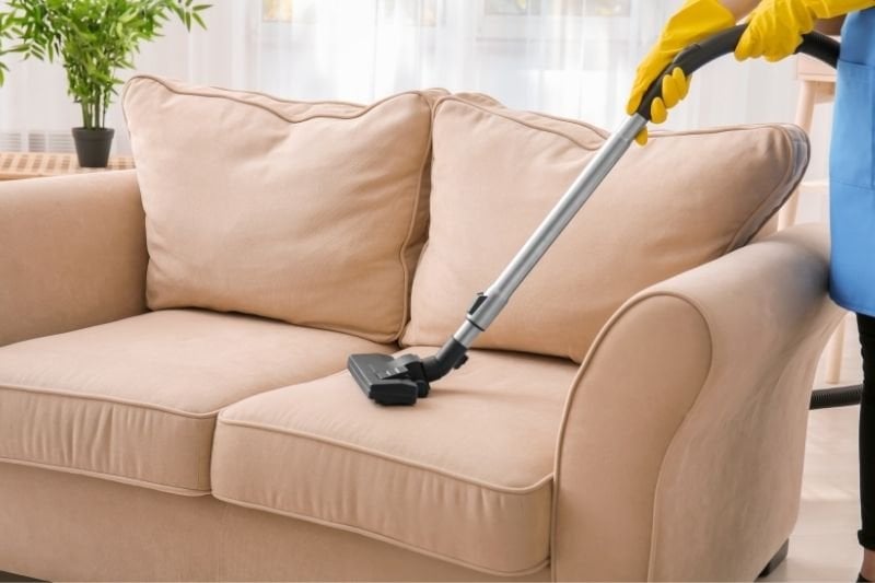 How do you clean sofas and armchairs?