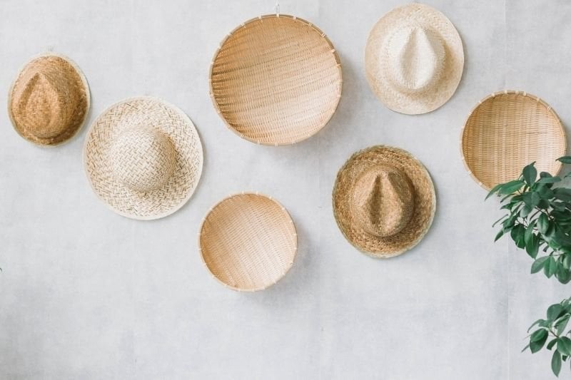 Wall decoration with straw hat