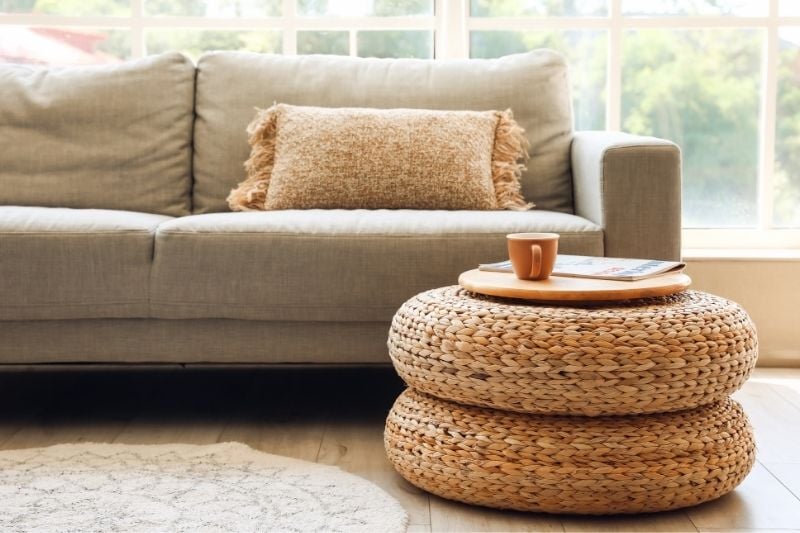 Decorate the coffee table with a pouf