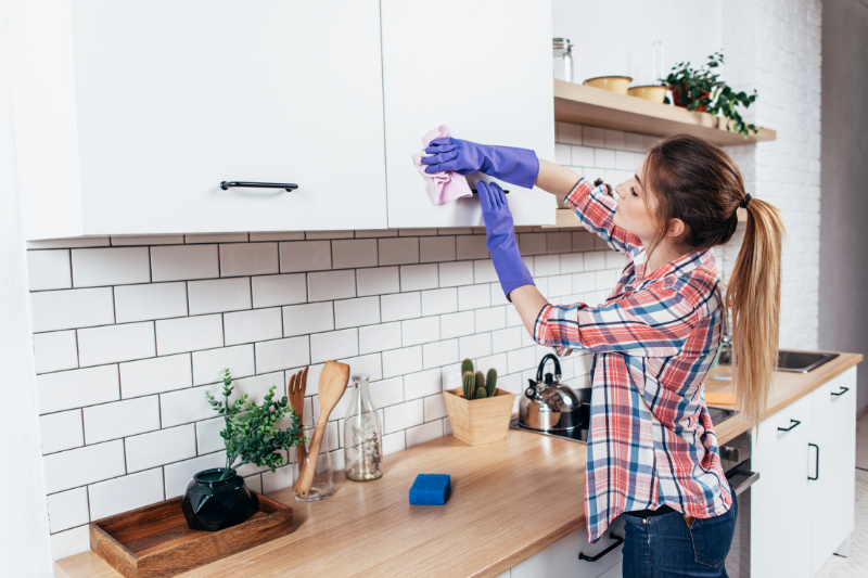 Clean kitchen cabinets with soap